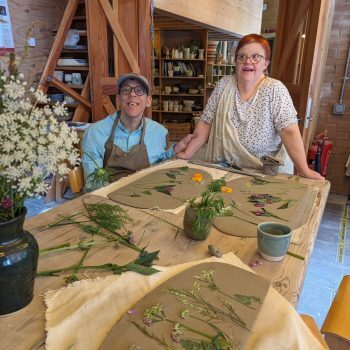 People we support in an arts and crafts workshop