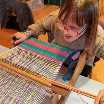 A person we support weaving