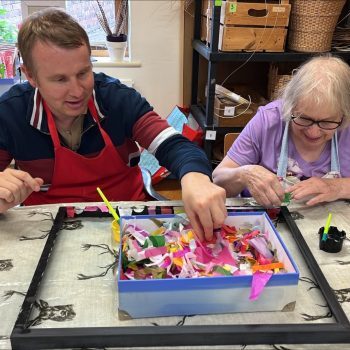 People in an arts and crafts workshop