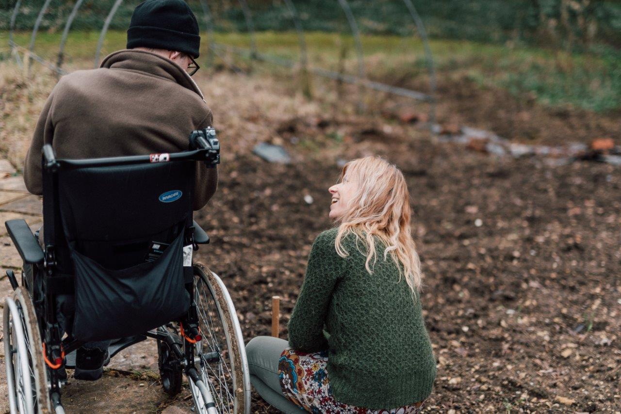 One of our support workers and a community member enjoying our nature and environment