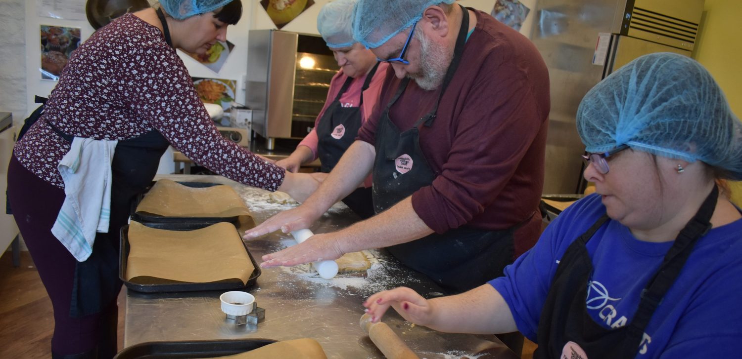 People we support at our hospitality school in Taurus Crafts, a Camphill Village Trust community, learning new skills