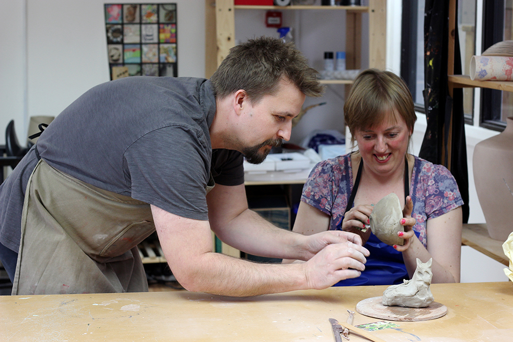 One of our support workers working with a person we support 