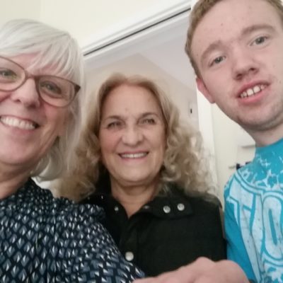 Daniel, Susanne and Carole standing together smiling