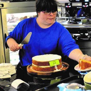 Person we support serving cake
