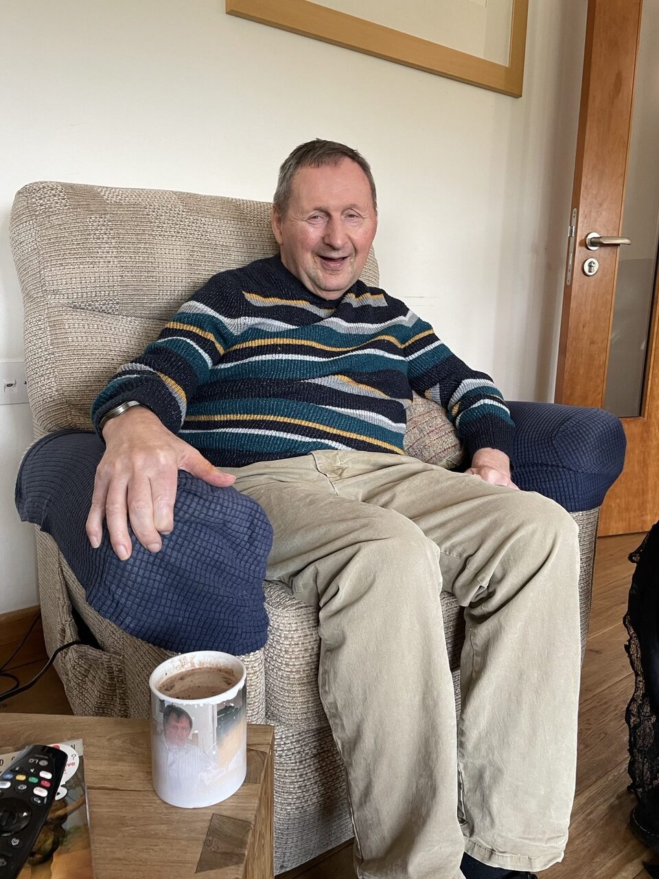 Two people walking down the road in one of our farms in a supported living environment