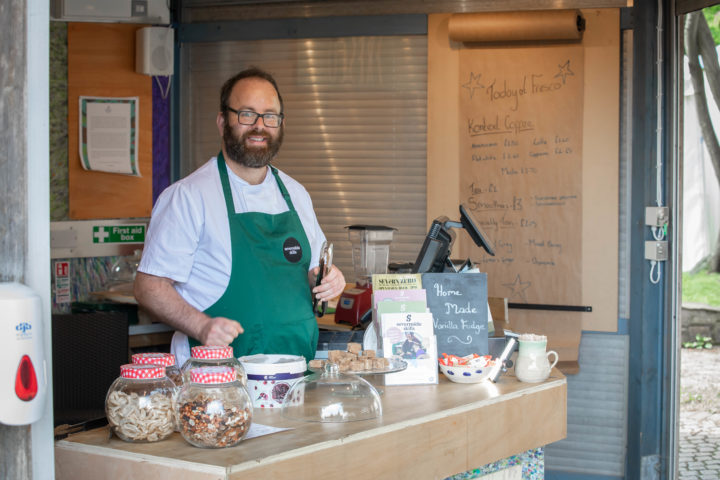 A person we support serving at Fresco cafe, Taurus Crafts