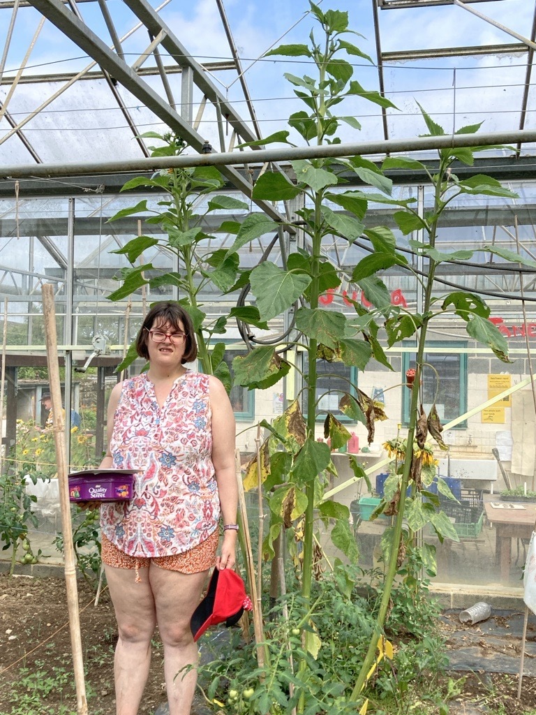 A person in one of our community gardens