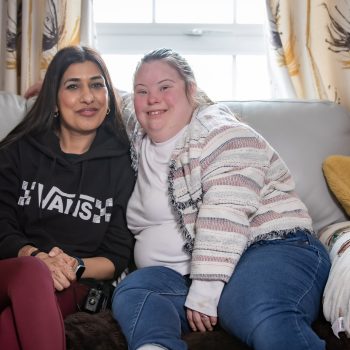 Jessie and Subia sat on the sofa
