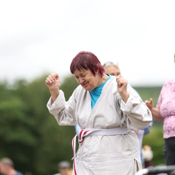 A person we support dancing