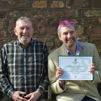 A person with a certificate