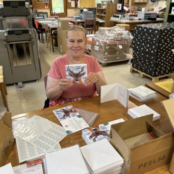 Catherine holding a christmas card