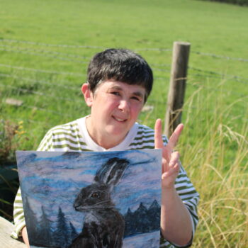 Suzette with her card