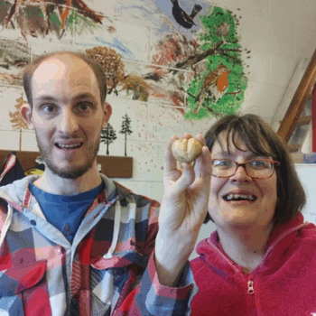 A person holding potatoes