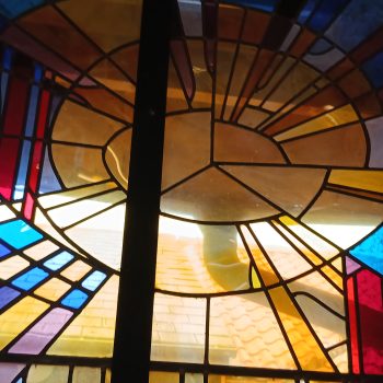 A photo of a stain glassed window