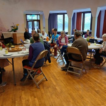People sitting in a hall