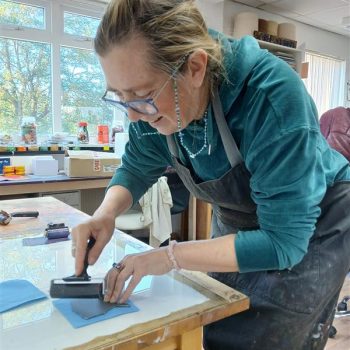 People doing lino printing