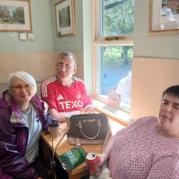 People sat in a cafe