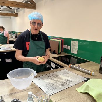 Ben cooking in a kitchen