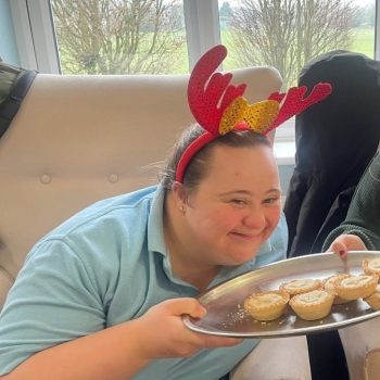 Hannah holding mince pies
