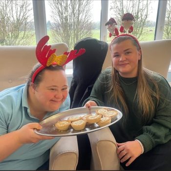 Hannah with support worker for Christmas