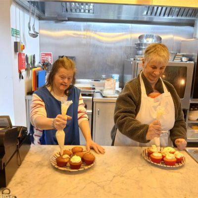 People we support icing cakes