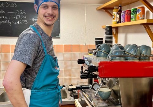 One of the people we support working in the kitchen