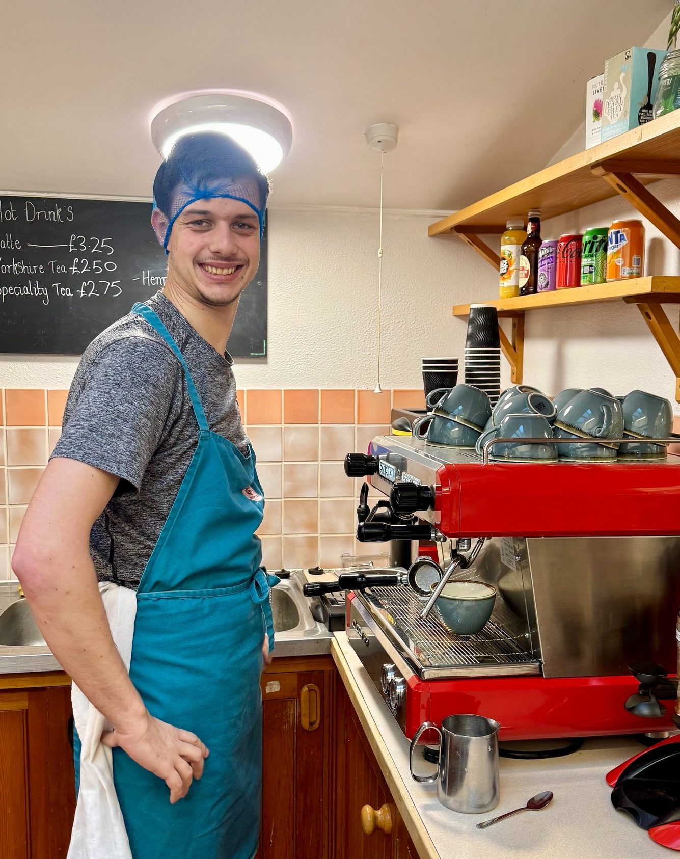 One of the people we support working in the kitchen