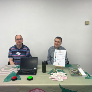 Simon and Paul sitting at the table