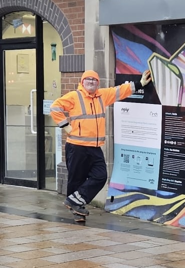 Sean standing outside wearing a high-vis jacket