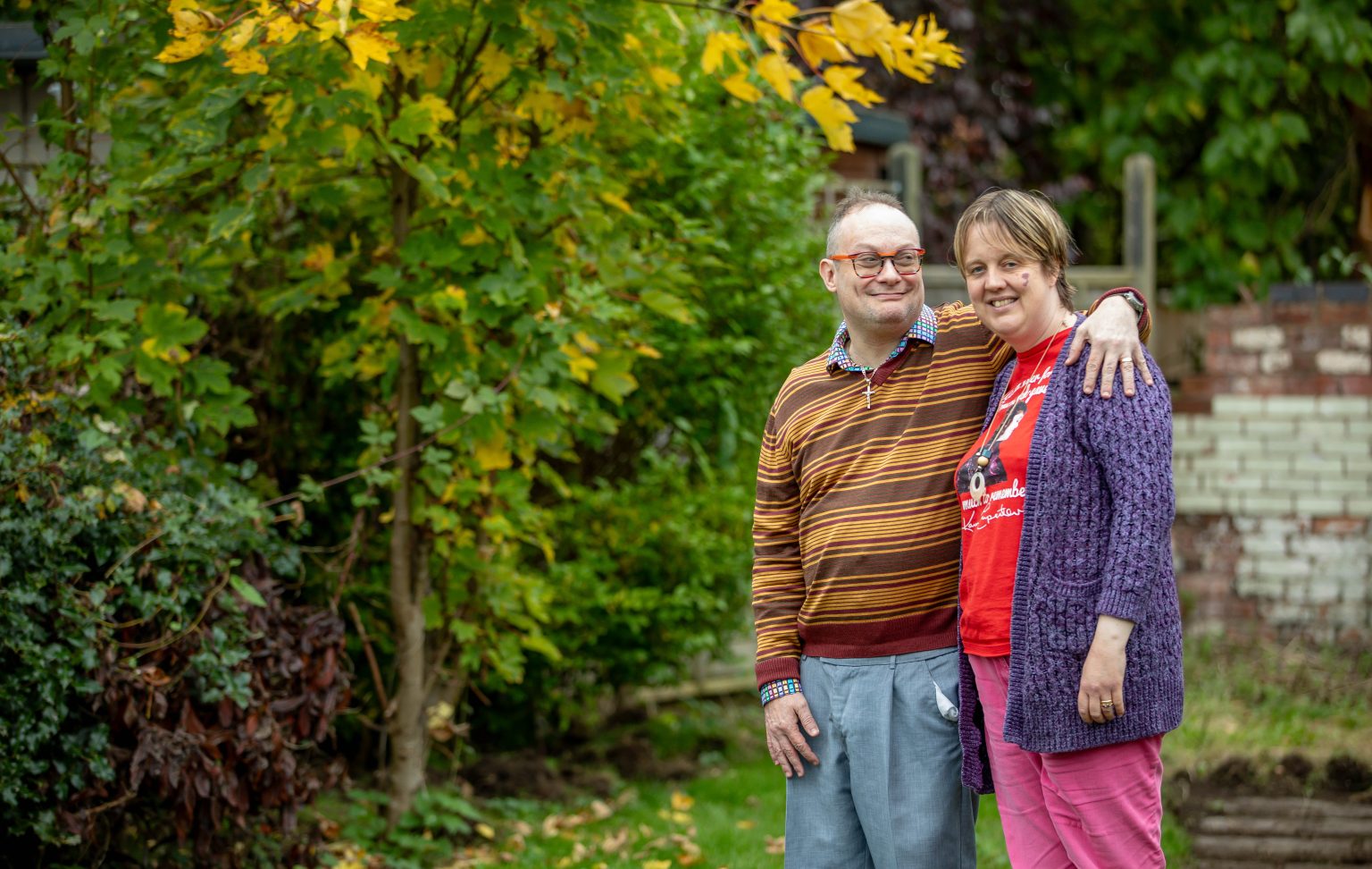 Two people smiling