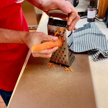 A person grating