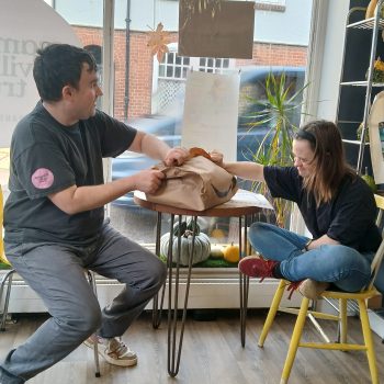 People opening an amazon parcel
